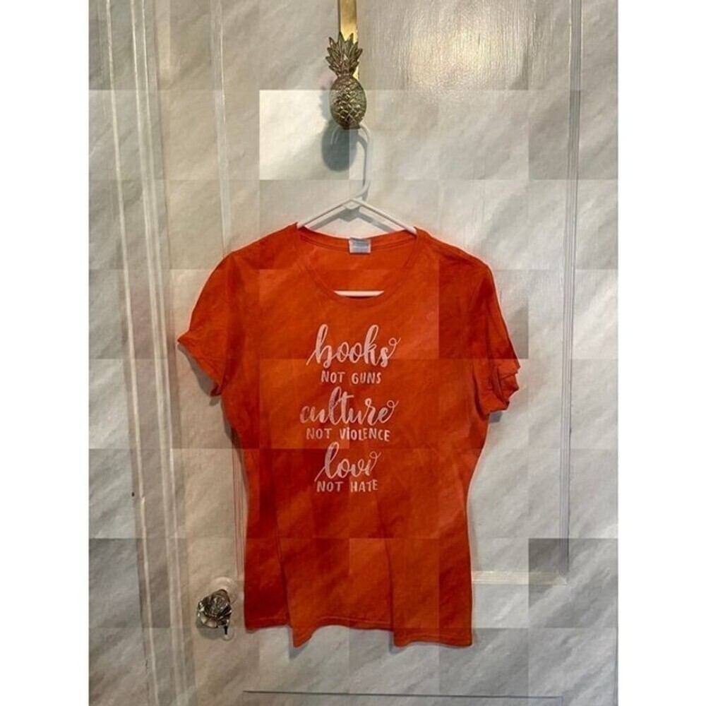 Women's size Medium Books not Guns, Culture not Violence, Love not Hate Orange T